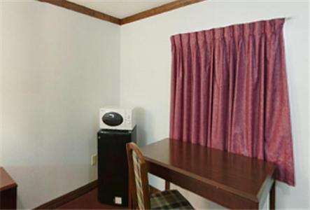 Executive Inn Muldrow Buitenkant foto